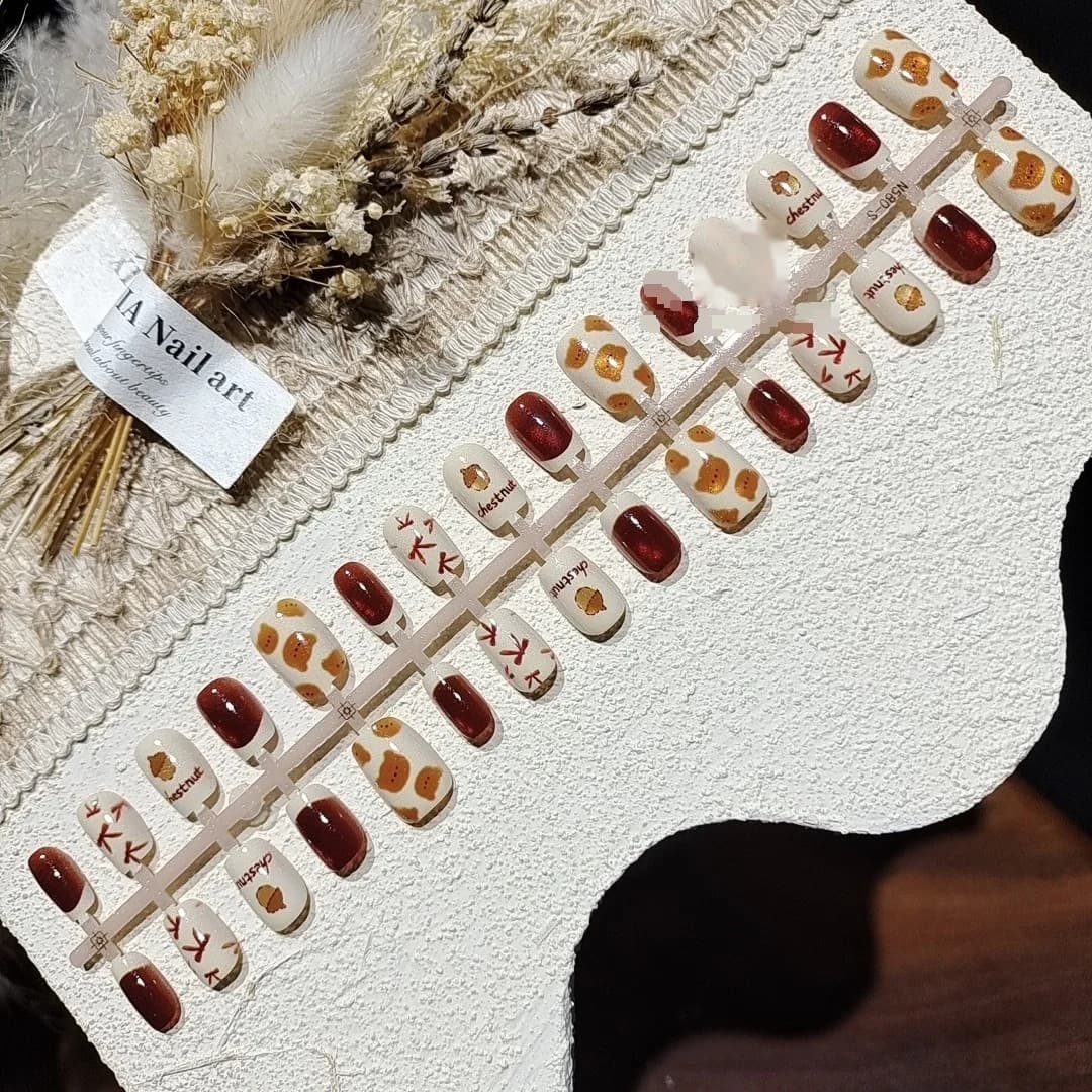 Kastanjebrun bjørn katteøye falske negler kort ballerinaform glimmer